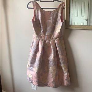 Designer cocktail dress in size M